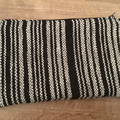 Brown and cream colour-coded clutch bag
