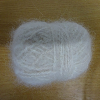 Small ball of handspun yarn made using dog hair